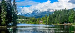 Paddleboarding on lake in Whistler British Columbia