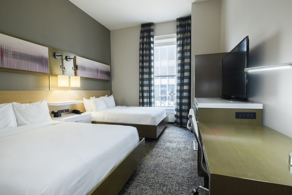 Deluxe queen room with two beds