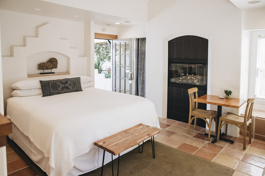 Hotel bedroom with fireplace
