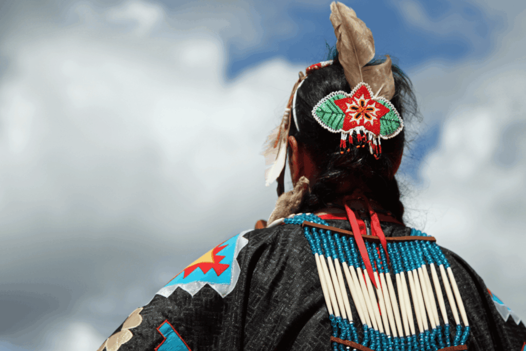 Navajos dancers wearing ceremonial clothes