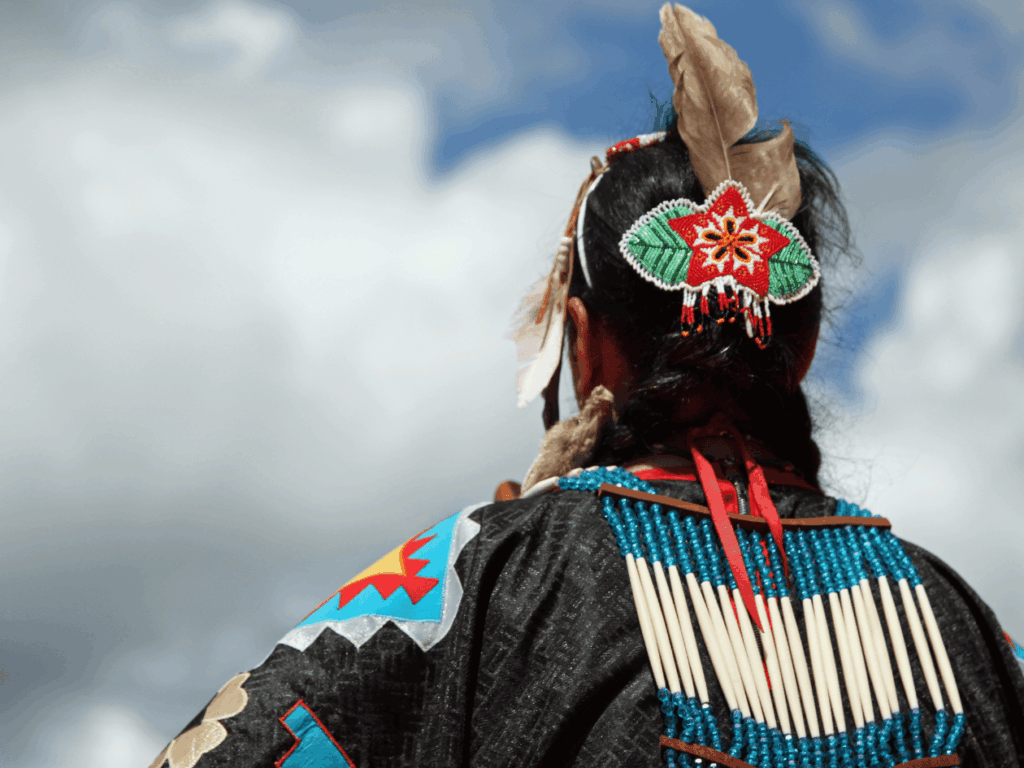 Navajos dancers wearing ceremonial clothes