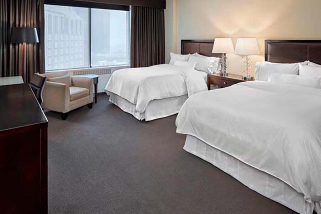 Hotel guest room with two beds