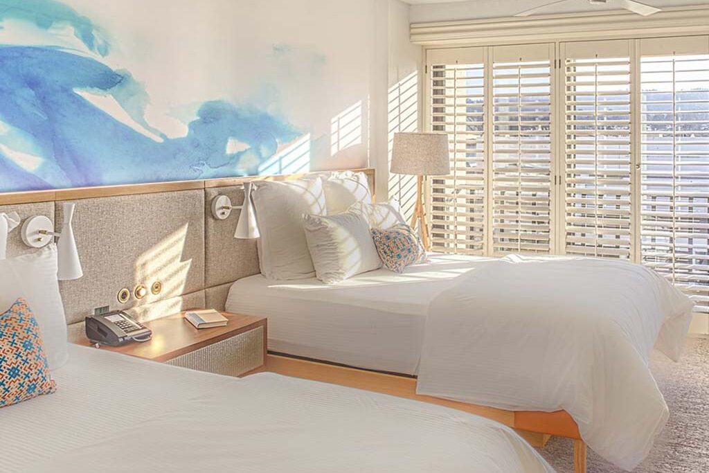 Hotel guest room with two beds