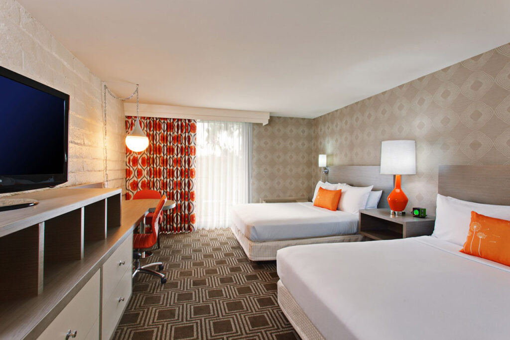 Hotel guest room with two beds