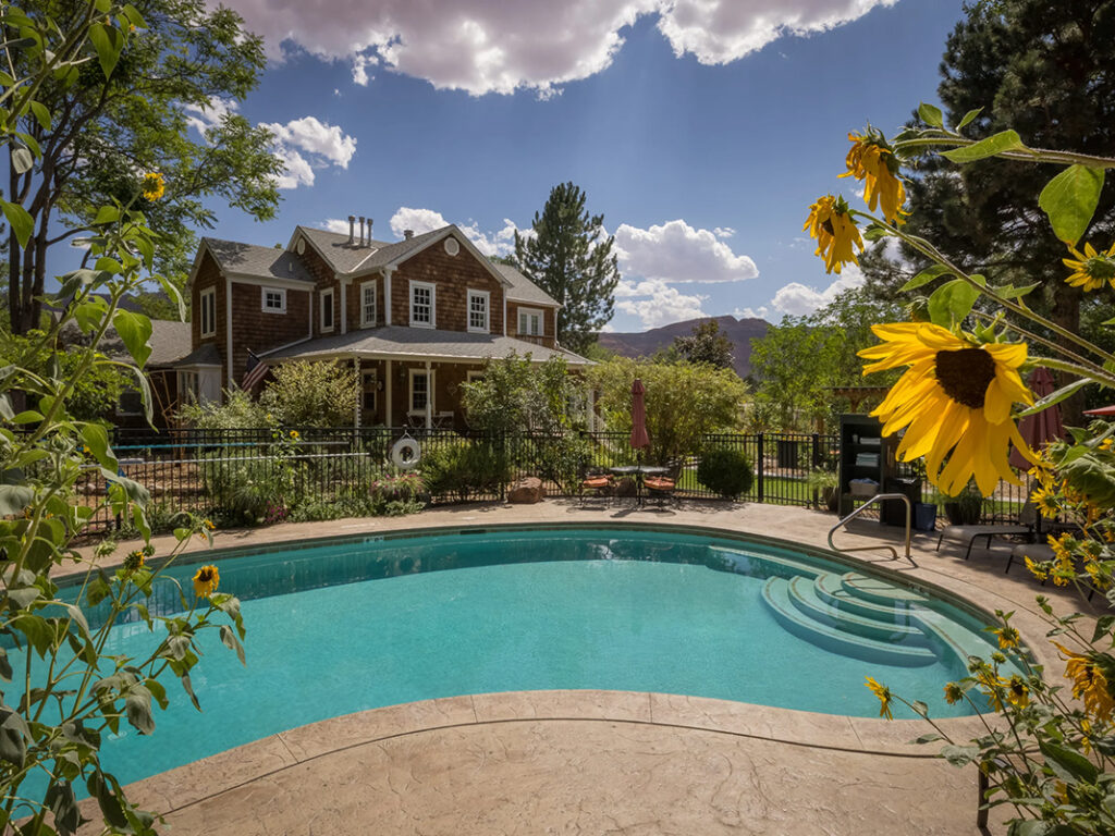 Inn exterior with a view of the pool