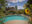 Inn exterior with a view of the pool