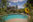 Inn exterior with a view of the pool