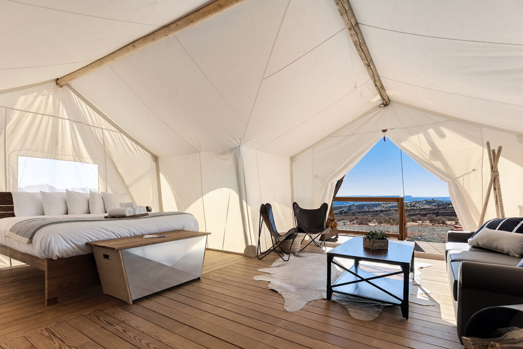 Inside a tent with king bed