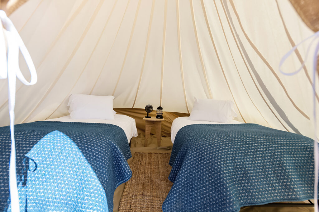Kids tent with two small single sized beds