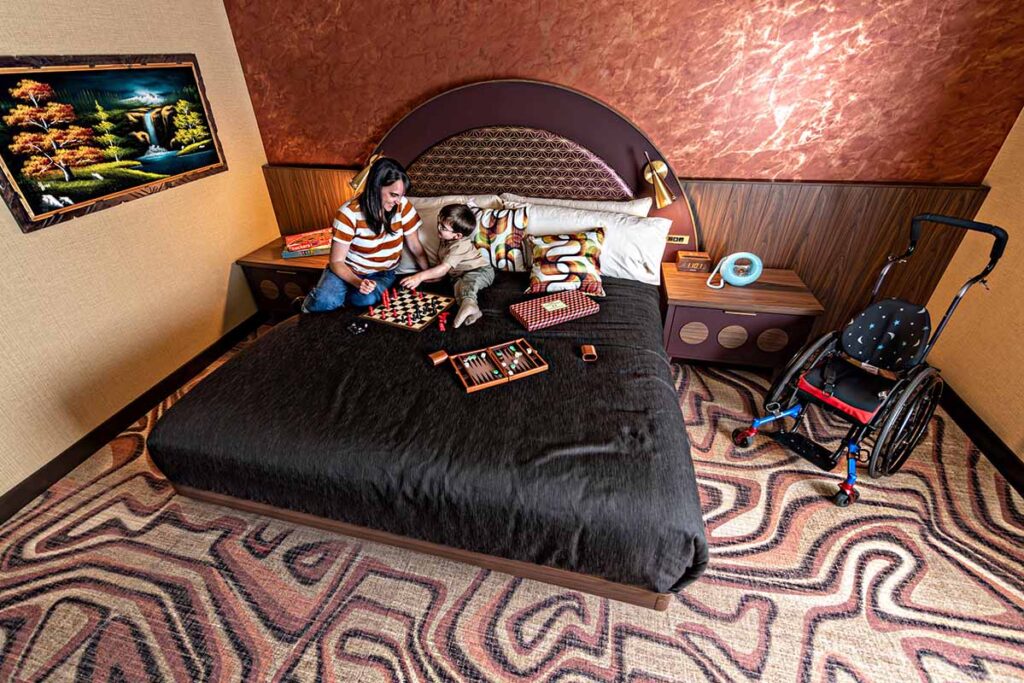 A mother and child in the accessible guest room