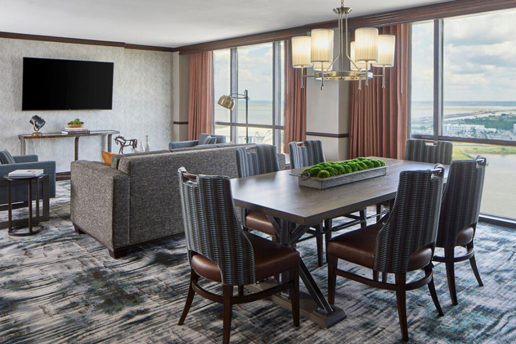 Executive suite with sofa and dining table