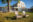 Exterior of hotels with lawn chairs
