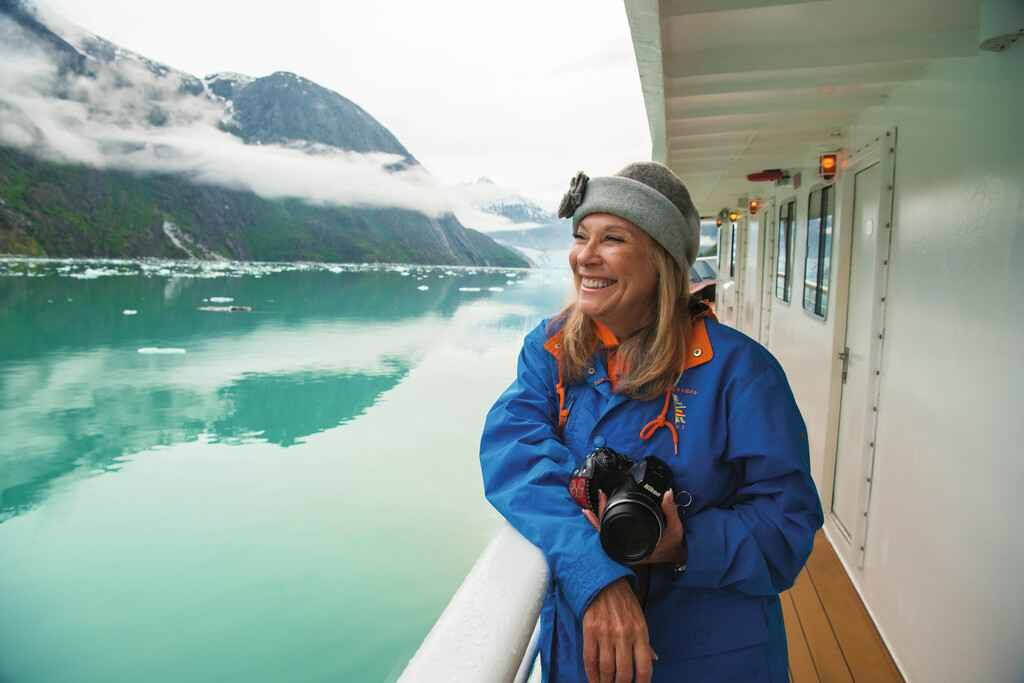 Viewing the scenery from the deck aboard the NG Sea Lion small cruise ship in Alaska