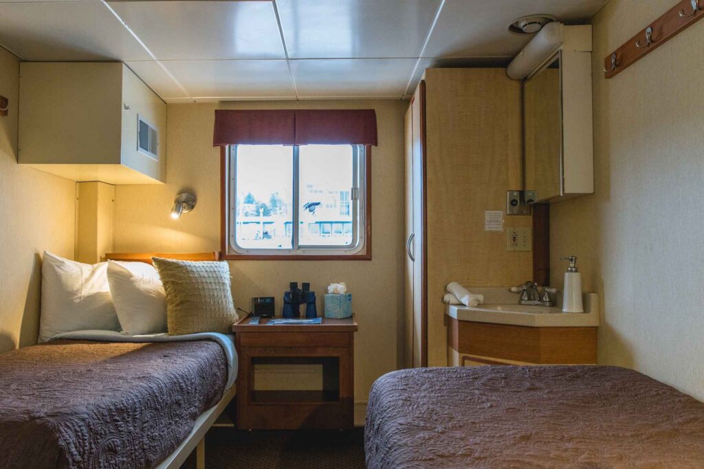The Trailblazer twin cabin aboard the Wilderness Discoverer small cruise ship in Alaska