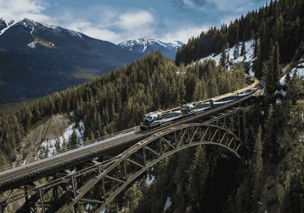 Rocky Mountaineer travelling across Stoney Creek Bridge on the First Passage to the West Route