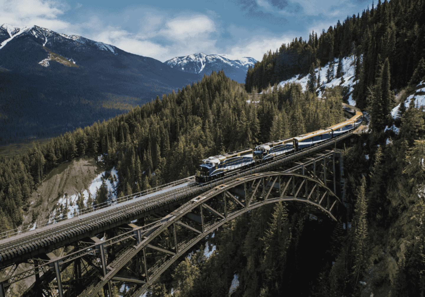 Rocky Mountaineer travelling across Stoney Creek Bridge on the First Passage to the West Route