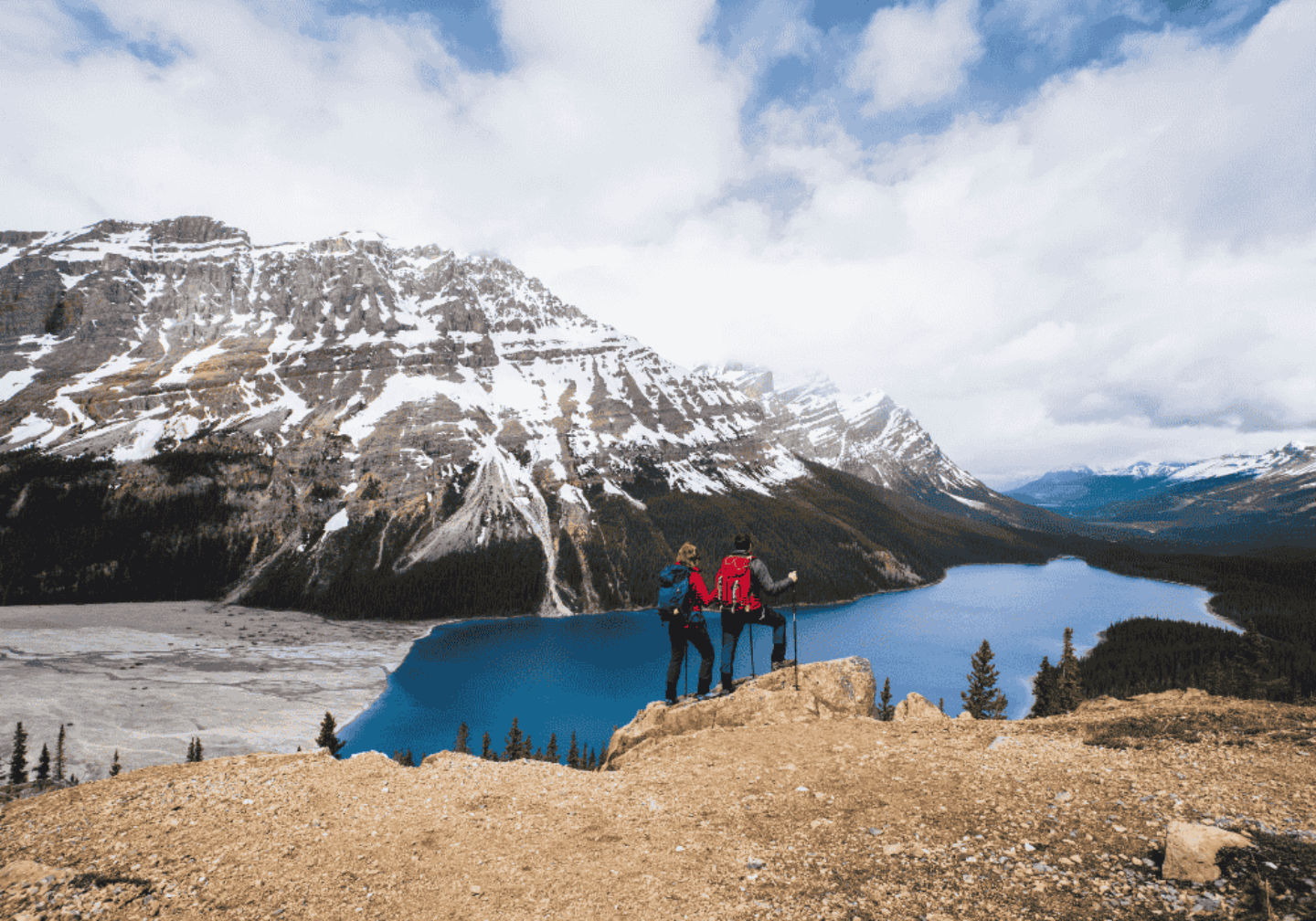Young couple in Peyto lake, Banff National Park in Canada