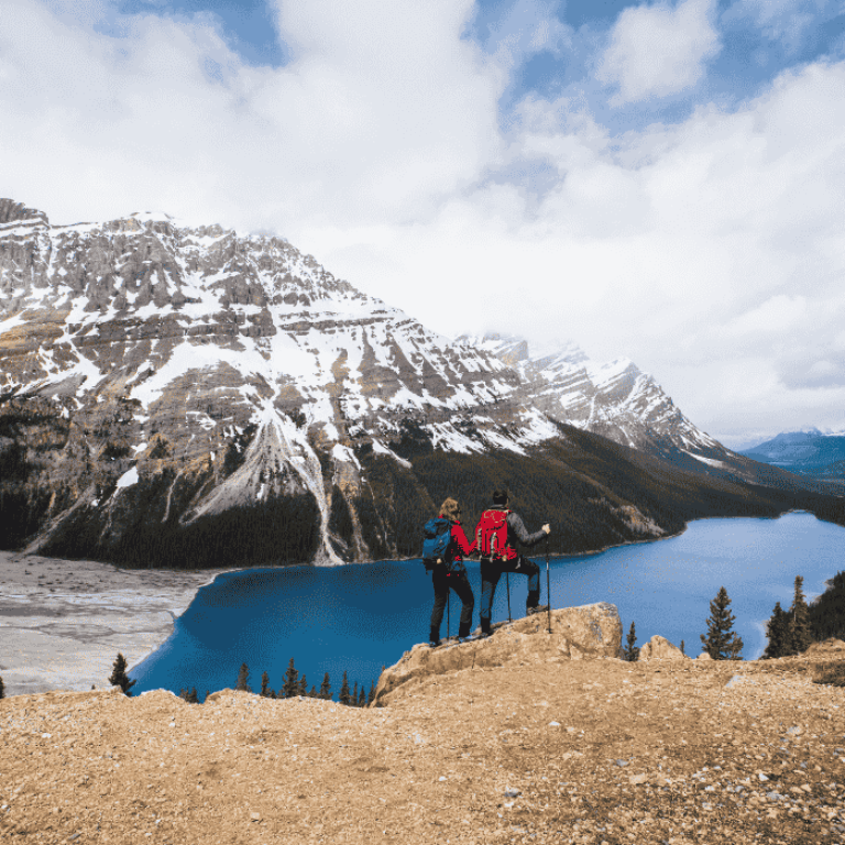Young couple in Peyto lake, Banff National Park in Canada
