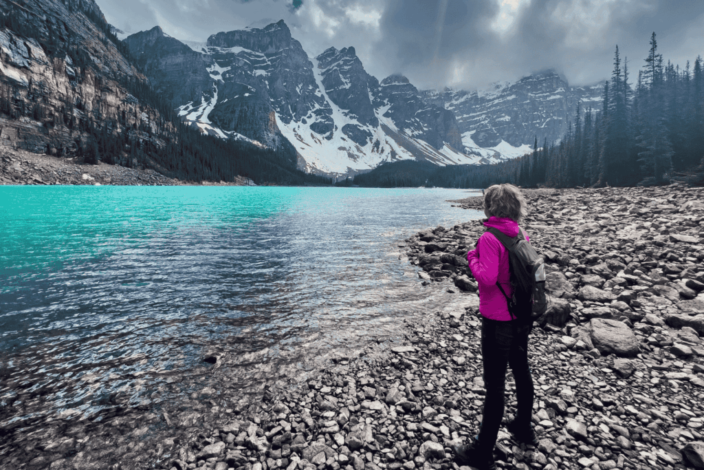 Young woman in Moraine lake, Banff National Park in Canada