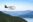 Seaplane flying over the mountains of Vancouver BC